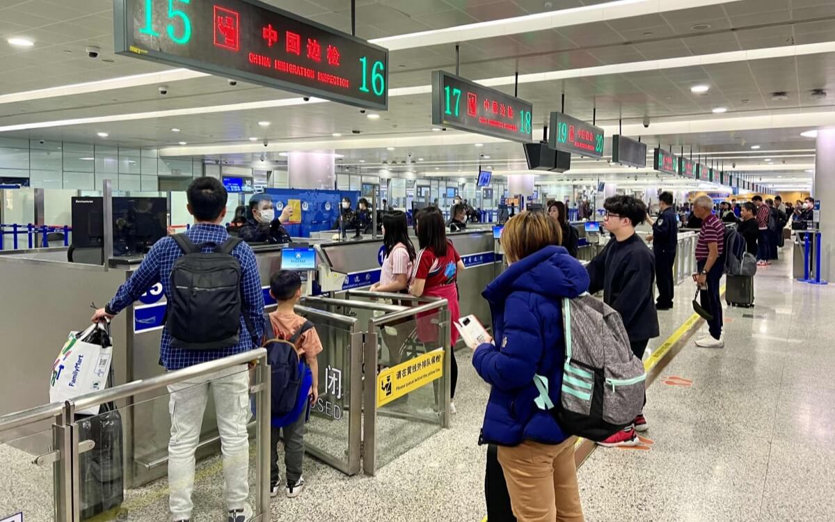 Travelers are going through immigration inspection.